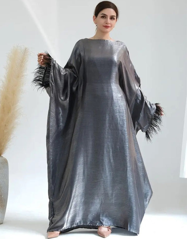 Enchanting Celebration: Feathered Abaya for Traditional Elegance